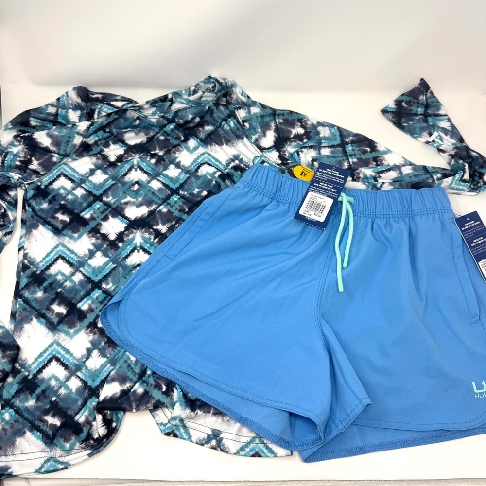 Huk Patterned Rash Guard and Light Blue Shorts